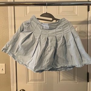 Light blue pleated skirt with pockets